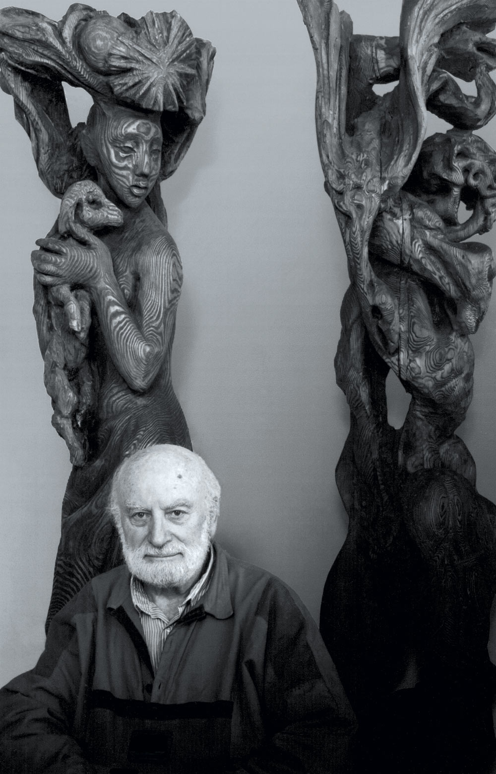 Portrait of Václav Lokvenc in front of his statues Aina Hita and Prometheus